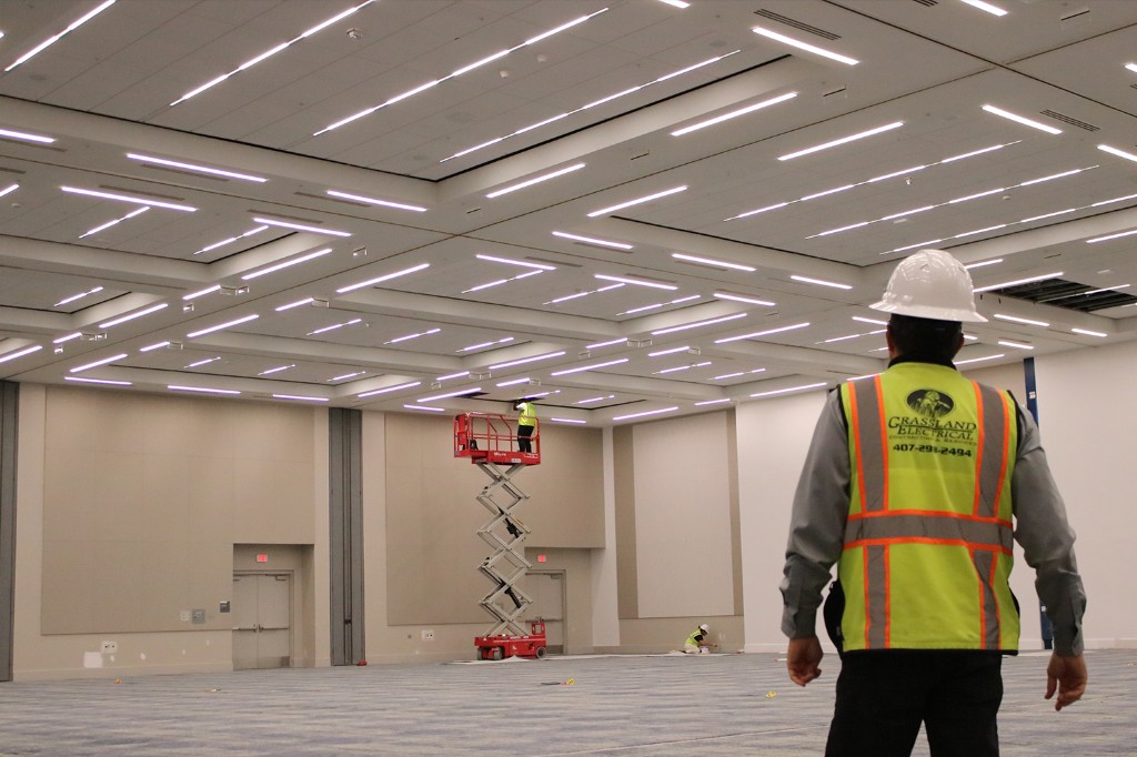 Finished ballroom with new linear lighting