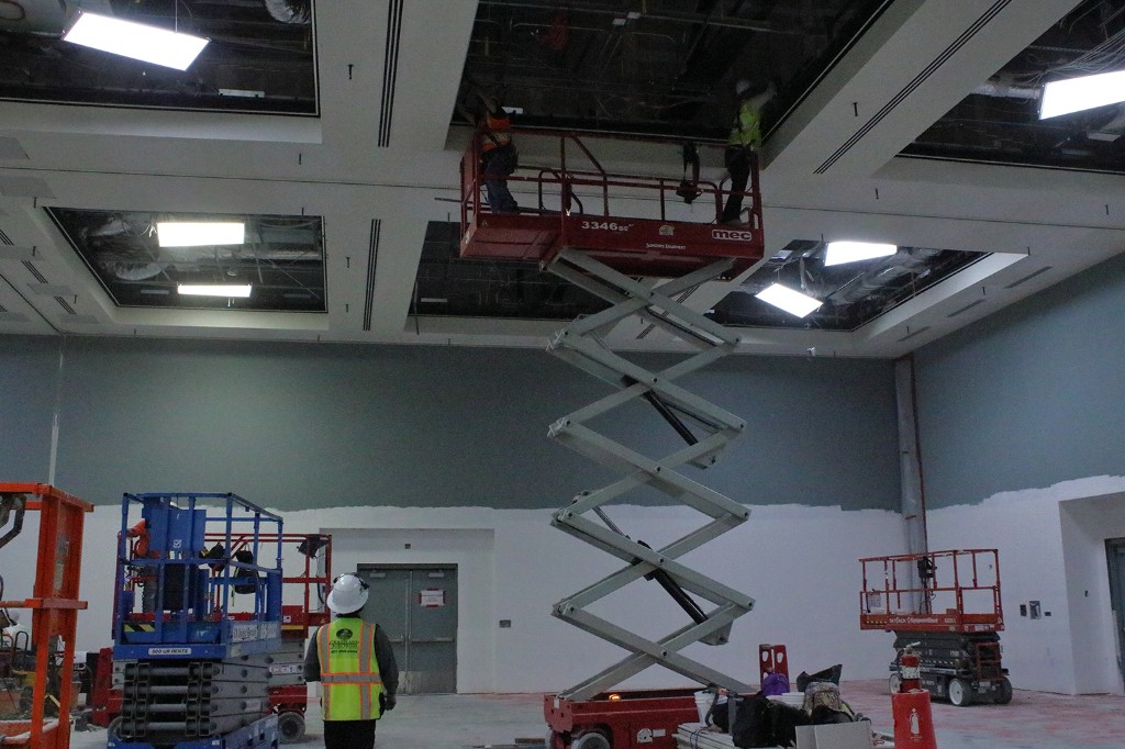 Overhead electrical work from a lift